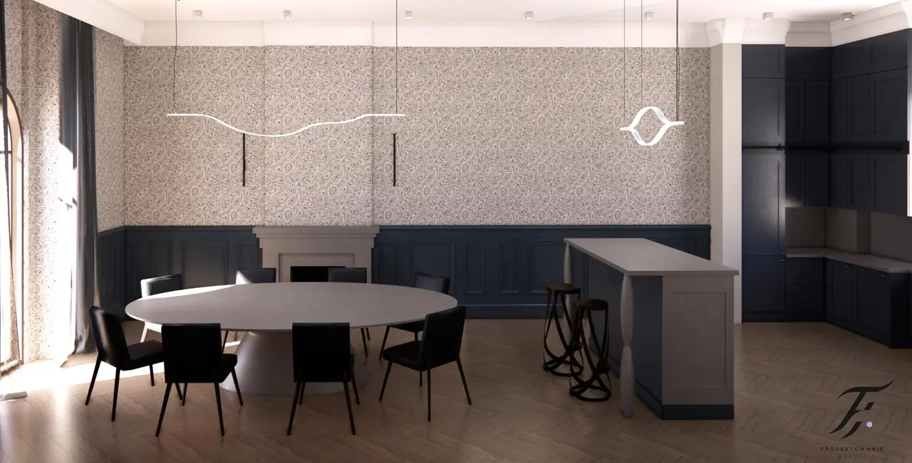 jadalnia połączoną z aneksem kuchennym. W centralnej części znajduje się kamienny, owalny stół otoczony ciemnymi, eleganckimi krzesłami. W tle widać ścianę pokrytą wzorzystą tapetą fornasetti a dolna część ściany jest wykończona drewnianymi panelami w ciemnoniebieskim kolorze. Nad stołem zawieszone są minimalistyczne, nowoczesne lampy o organicznych kształtach, które dodają wnętrzu futurystycznego charakteru. Po prawej stronie widoczny jest barek kuchenny z trzema stołkami barowymi oraz zabudowana kuchnia w ciemnoniebieskiej kolorystyce. Całe wnętrze utrzymane jest w eleganckim, stonowanym stylu, z dbałością o detale i harmonię kolorystyczną. Na podłodze znajduje się parkiet ułożony w jodełkę, co dodatkowo podkreśla luksusowy charakter pomieszczenia.